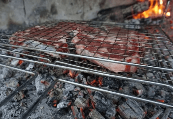 meat smoking under coal