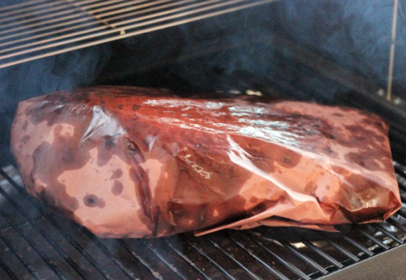 use of smoked beef for brisket in butcher paper in smoker